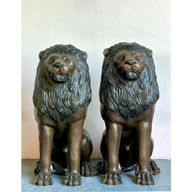 Command attention and instill a sense of timeless grandeur with this spectacular pair of monumental lion statues. Cast in...
