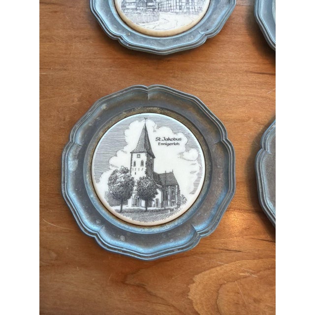 Vintage Georg Vetter Set of 8 Coasters featuring German landmarks. These collectible coasters are crafted with pewter rims...