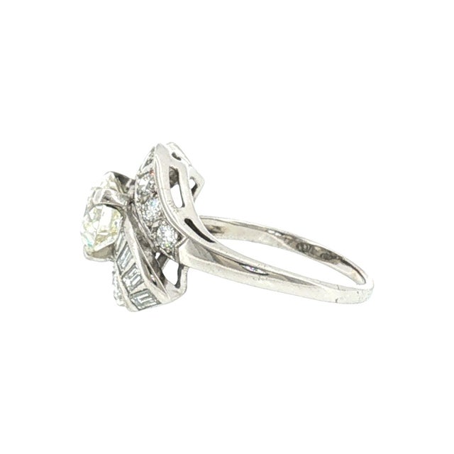 A 1950's 14k white gold cocktail ring featuring a 1.46 carat old European cut diamond, with a J color grade and SI1...
