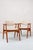 Two beautiful GM11 armchairs, designed by Erik Kirkegaard for Glostrup. The curved armrests are particularly striking,...
