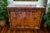 Stunning vintage campaign-style buffet and credenza by Heritage, featuring iconic mid-century craftsmanship and incredible...