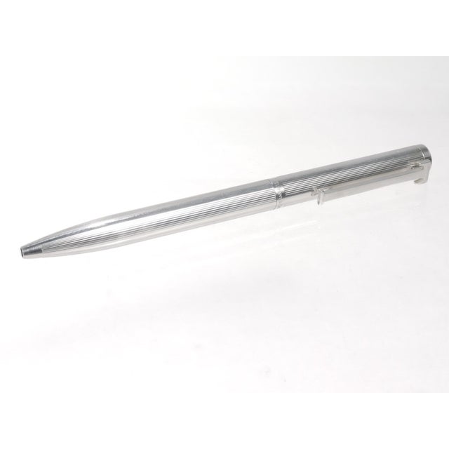 A fine T Clip Executive ballpoint pen. By Tiffany & Co. In sterling silver. Together with its original box. Simply a...
