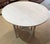 Vintage Whitewashed Drop-Leaf Round Accent Table in the Swedish Country Style For Sale In Los Angeles - Image 6 of 8