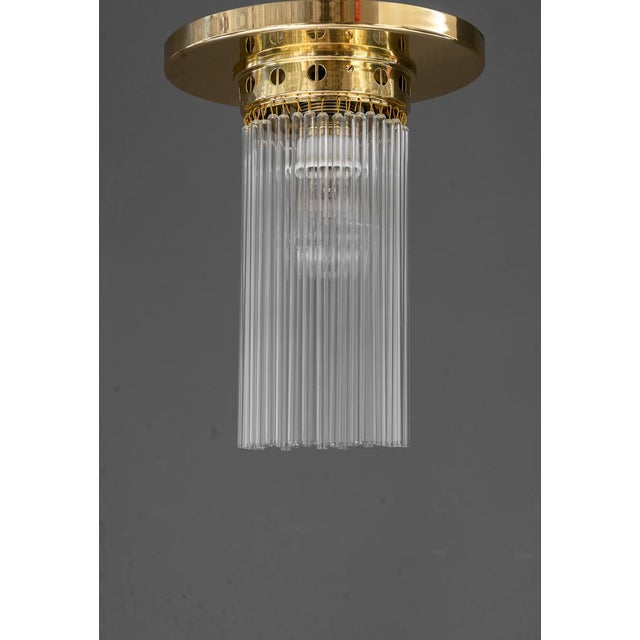 2x Art deco ceiling lamps with glass sticks around 1920s Brass polished and stove enameled The glass sticks are replaced (...