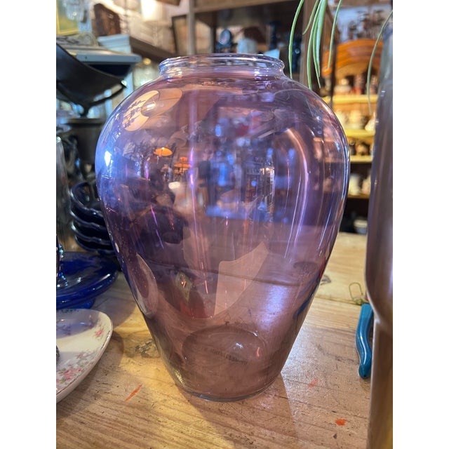 Hand Made with Recycled Glass in Spain. Purple iridescent glass vase measuring 8” tall and about 6” wide.