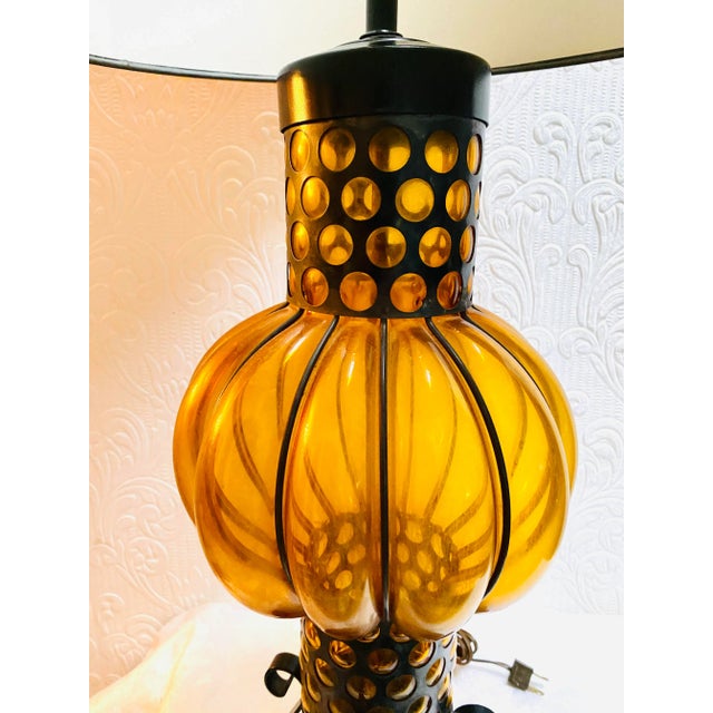 Such a fabulous example of a mid century caged glass lamp! It is a large lamp measuring 40 1/2” tall with shade, 23” tall...