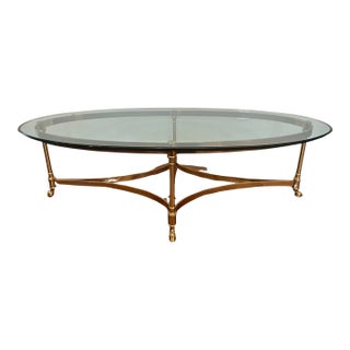 La Barge Attributed Mid-Century Oval Brass and Glass Coffee Table with Hoofed Feet, Patinated Brass For Sale