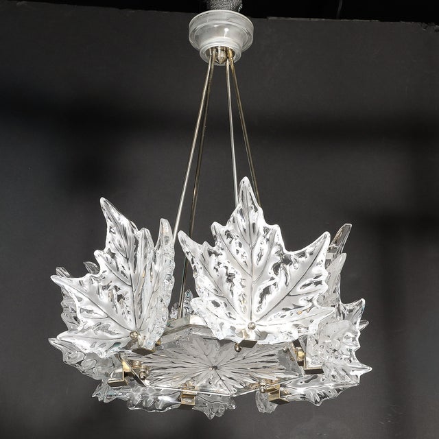 This exceptional chandelier in Lalique’s iconic Champs Élysées motif in rendered in sculpted, frosted crystal leaves,...