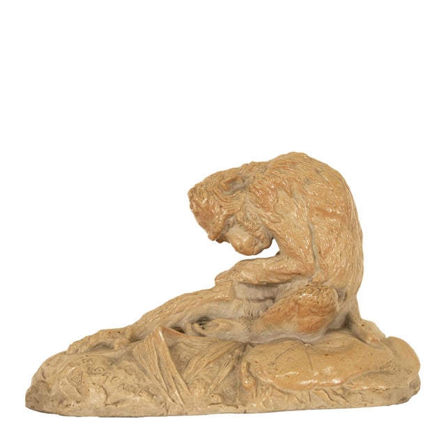 A finely detailed antique French terracotta monkey statue by the French sculptor Emmanuel Frémiet (1824–1910), signed and...