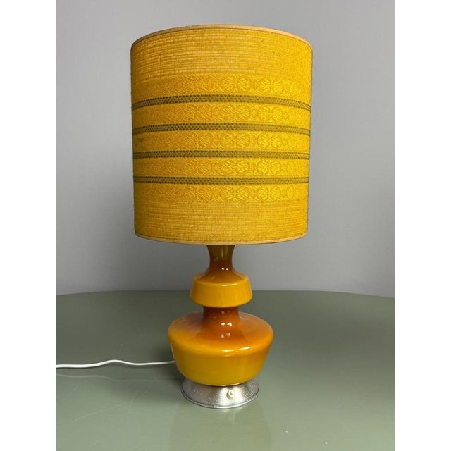 A striking Belgian Mid-Century table lamp by Glasfabriek De Rupel / Massive, dating from the 1960s–70s, featuring a...