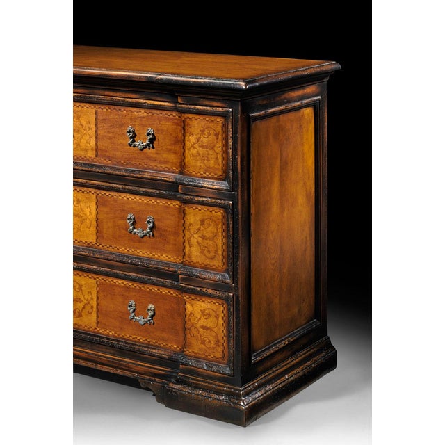 Handcrafted in Italy from solid walnut, this Venetian-style chest features three spacious drawers with decorative cherry...