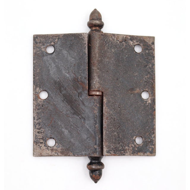 This door hinge is made of cast iron with acorn tips, a lift off knuckle, and a template hole pattern. The original...