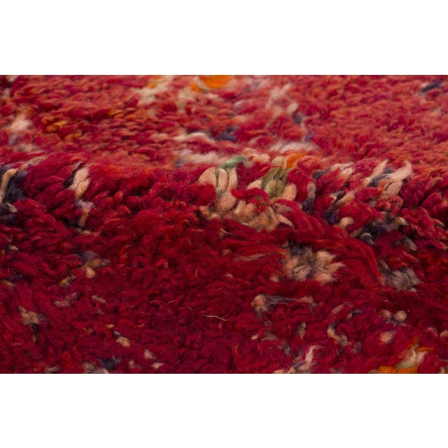Hand-knotted in wool and originating circa 1950-1959, this 6x11 vintage Moroccan shag rug joins Rug & Kilim’s Moroccan...