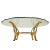 Hollywood Regency Brass & Glass Sculptural Coffee Table Bring timeless glamour to your living space with this Hollywood...