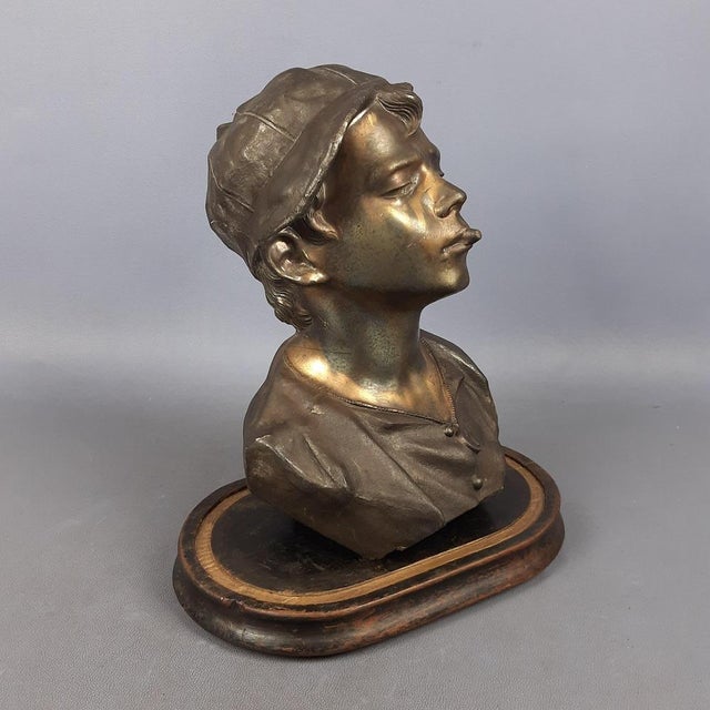Stunning large vintage Neapolitan scugnizzo bust sculpture, handcrafted in burnished antimony and gold, on a wooden base....