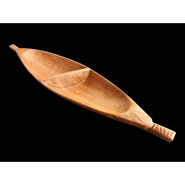 Offered is an incredibly sleek, sharp detailed partitioned snack bowl, probably mango wood. The bow and stern and bridge...