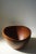 Beautiful patinated bowl in teak. Handcrafted in 1960s. Suits the modern interior.
