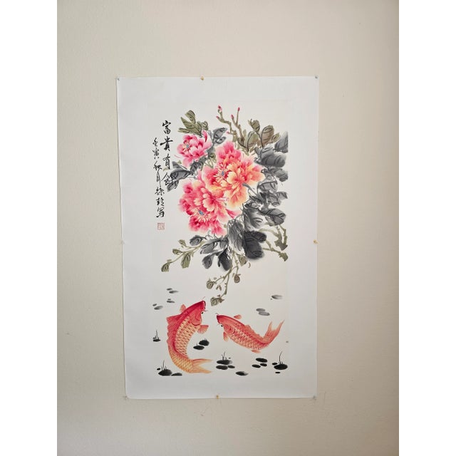 “Fu Gui You Yu（富贵有余）” is a contemporary Chinese ink-and-color painting on xuan paper, depicting lush peonies (prosperity &...
