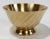 Lovely vintage Hollywood Regency style solid brass bowl with swirl pattern to exterior. Features round pedestal base and...