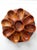 Mid-century carved wood lazy Susan serving tray set featuring a rotating round tray with coordinating individual bowls....