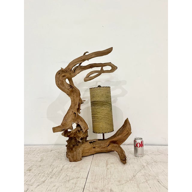Mid century driftwood table lamp. Large sculptural piece of driftwood with lamp socket on the base. Comes with original...