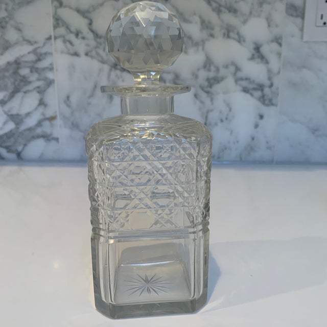 This is a lovely pair of diamond cut and fluted late 18th century English decanters. Rather than the usual square form,...