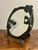 A striking 1960s tabletop vanity mirror in the French Art Nouveau revival style. The sculptural frame features an elegant...