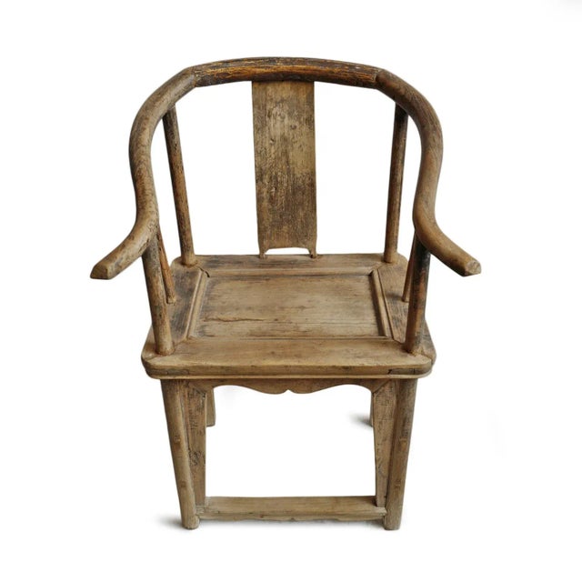 Antique raw elm horseshoe back chair. Beautiful aged patina and sun bleached wood. Seat height is 20".