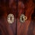 Pair of very large French demi-lune sideboards with dark gray stone tops and mahogany-veneered cases resting on solid...