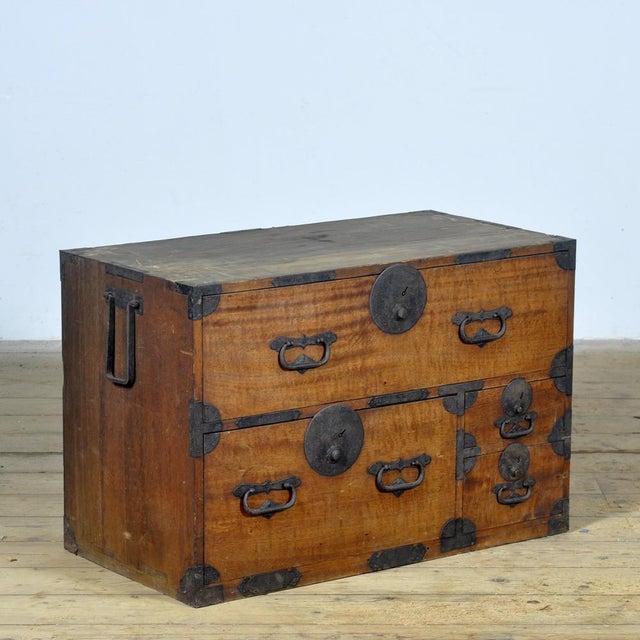 Traditional Japanese Tansu chest of drawers from the 1890s. Made during the late Meiji era (1868-1912), this piece exudes...