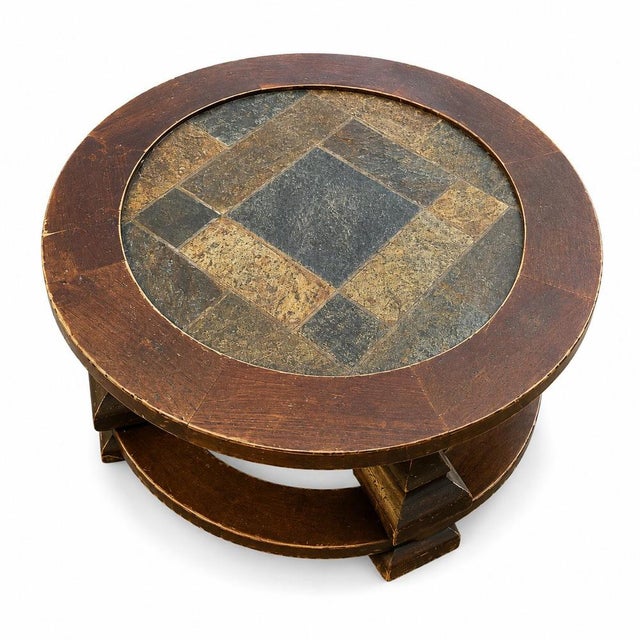 Pretty round coffee table in stone and solid wood. Dimensions: height 45, width and depth 87.