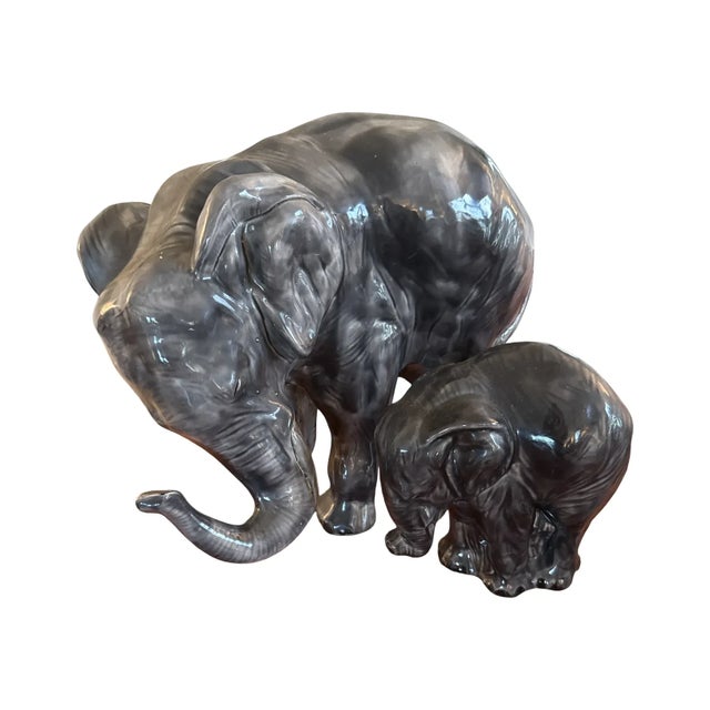 Striking pair of large mid-century Japanese ceramic elephants (stamped Japan), dating to the 1950s–70s. This impressive...