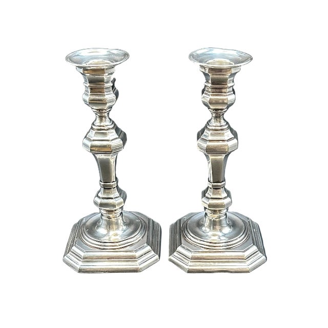 Elevate your table, mantel, or dining display with this elegant pair of vintage William Adams silverplate candlesticks....