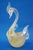 A magnificent clear blown glass sculpture, with aventurine inclusions of gold leaf, depicting a swan. It is unsigned and...