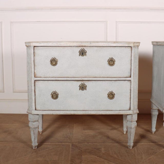 Lovely pair of early 19th C Swedish painted commodes with faux marble tops. 1820. This piece is designed in the style of...