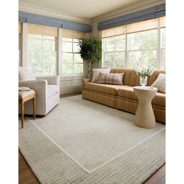 The Briggs Collection by Chris Loves Julia x Loloi is a beautifully detailed area rug with a soft, muted palette and...