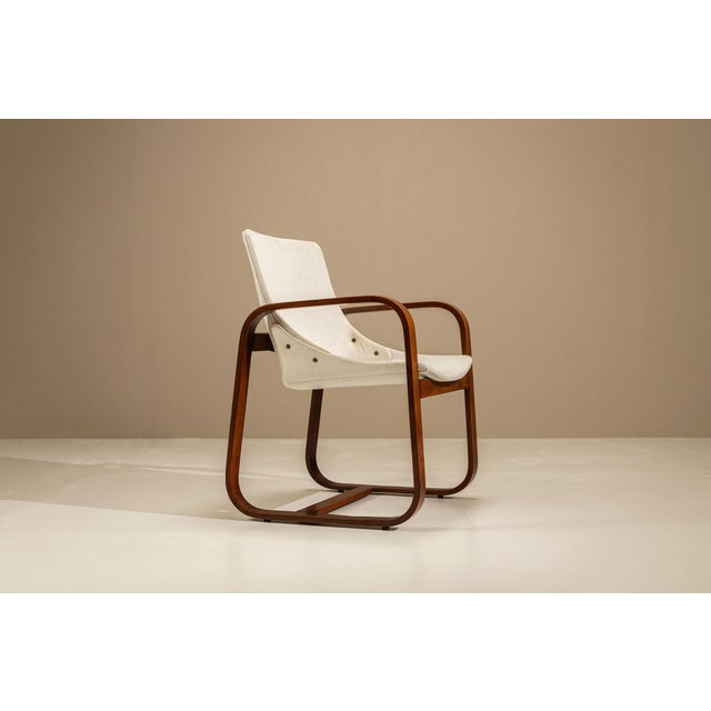A clear expression of Italian Rationalist design, this rare armchair by Giuseppe Pagano Pogatschnig and Gino Maggioni...