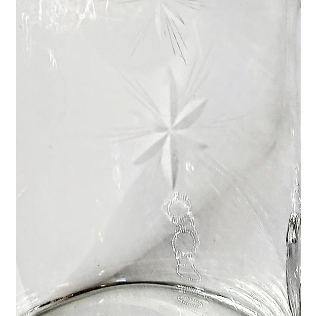 This flawless pitcher is ready for a great new home! The starbursts are spaced evenly around the pitcher, the handle is...
