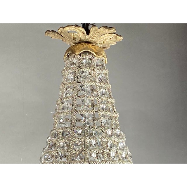 Illuminate your interior with refined European elegance using this 1980s French Louis XVI–style petit chandelier, a...