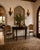 Elegant antique George III mahogany demi-lune console table featuring a classic half-moon top with rich figured mahogany...