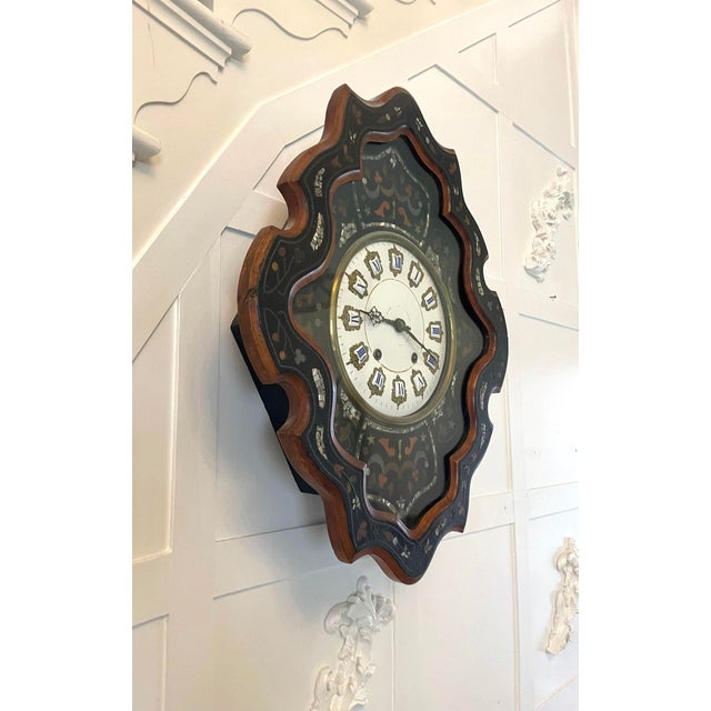Antique Victorian quality French wall clock in an attractive walnut and ebonised shaped case having a fantastic inlaid...