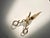 A wonderfully sculptural vintage brass candle wick trimmer and snuffer featuring ornate scrolling handles, oversized...