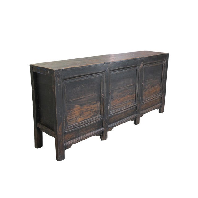 This late 19th century style sideboard and entertainment center is handmade using pine, featuring a weathered black finish...