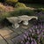 A pair of mid-twentieth-century French cast-concrete garden geese, circa 1950s, comprising two complementary sculptural...