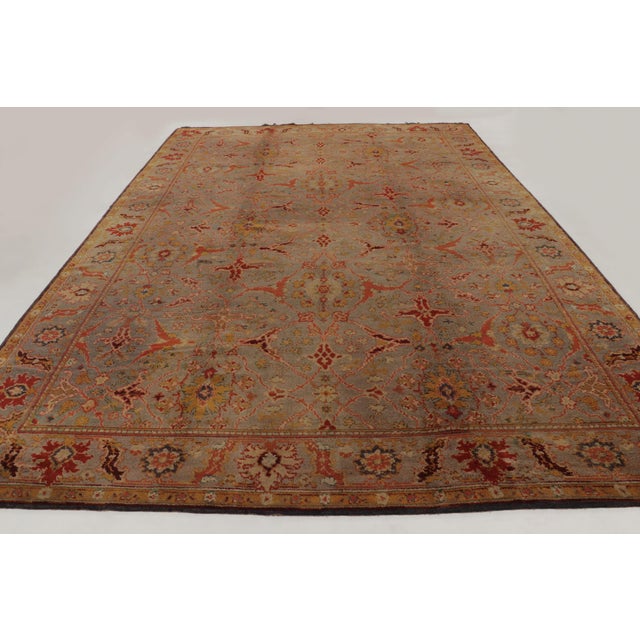 This 12x17 oversized antique Axminster rug is an exciting new addition to Rug & Kilim’s Antique rug collection; a...