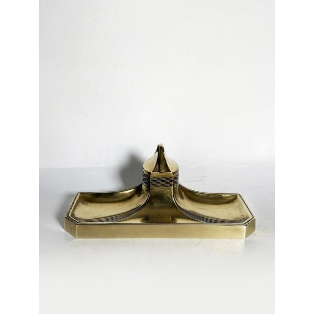 Art Nouveau style brass inkwell, France, circa 1900, with an elegant and symmetrical design typical of late 19th-century...