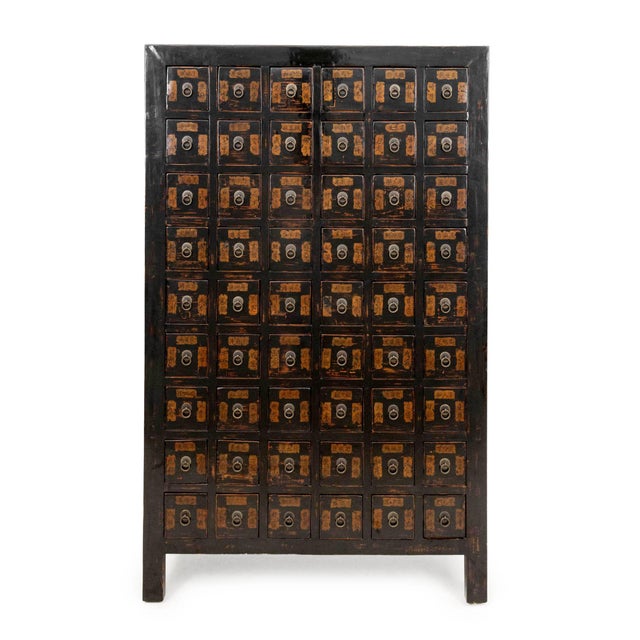 Chinese Black Lacquered Apothecary Cabinet, 19th century, labels with calligraphy to the faces of the 54 drawers. 73" H x...