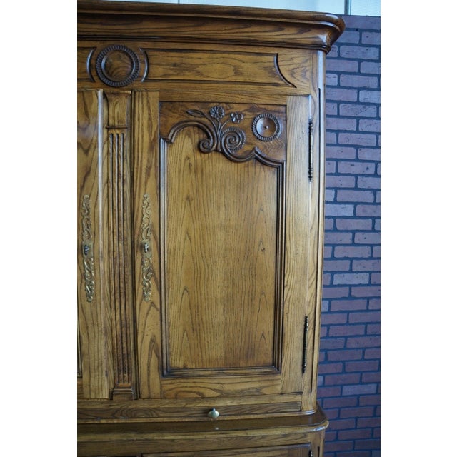 Finely crafted by Baker this dry bar cabinet features Pierre Deux styling. With versatile storage options it can be used...