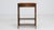 A circa 1900 French side table designed in the Art Nouveau style, featuring a rectangular top supported by a structured...