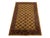 An allover pattern of repeating octagonal gul motifs gives this tribal area rug its distinctive rhythm. The golden-ochre...